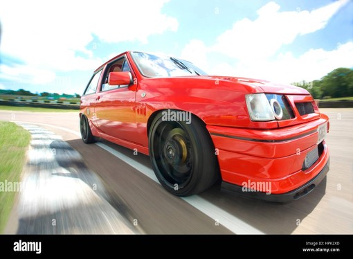 red vauxhall nova alt